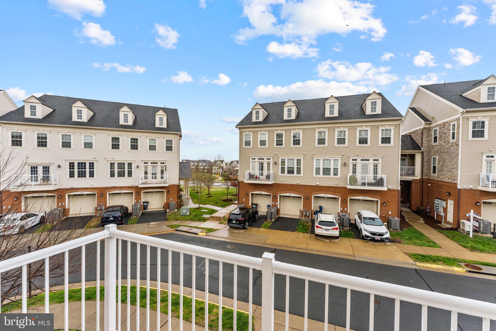 42558 Sunset Ridge Square Ashburn, VA 20148 - Photo 27 of 51 a view of a building with a street