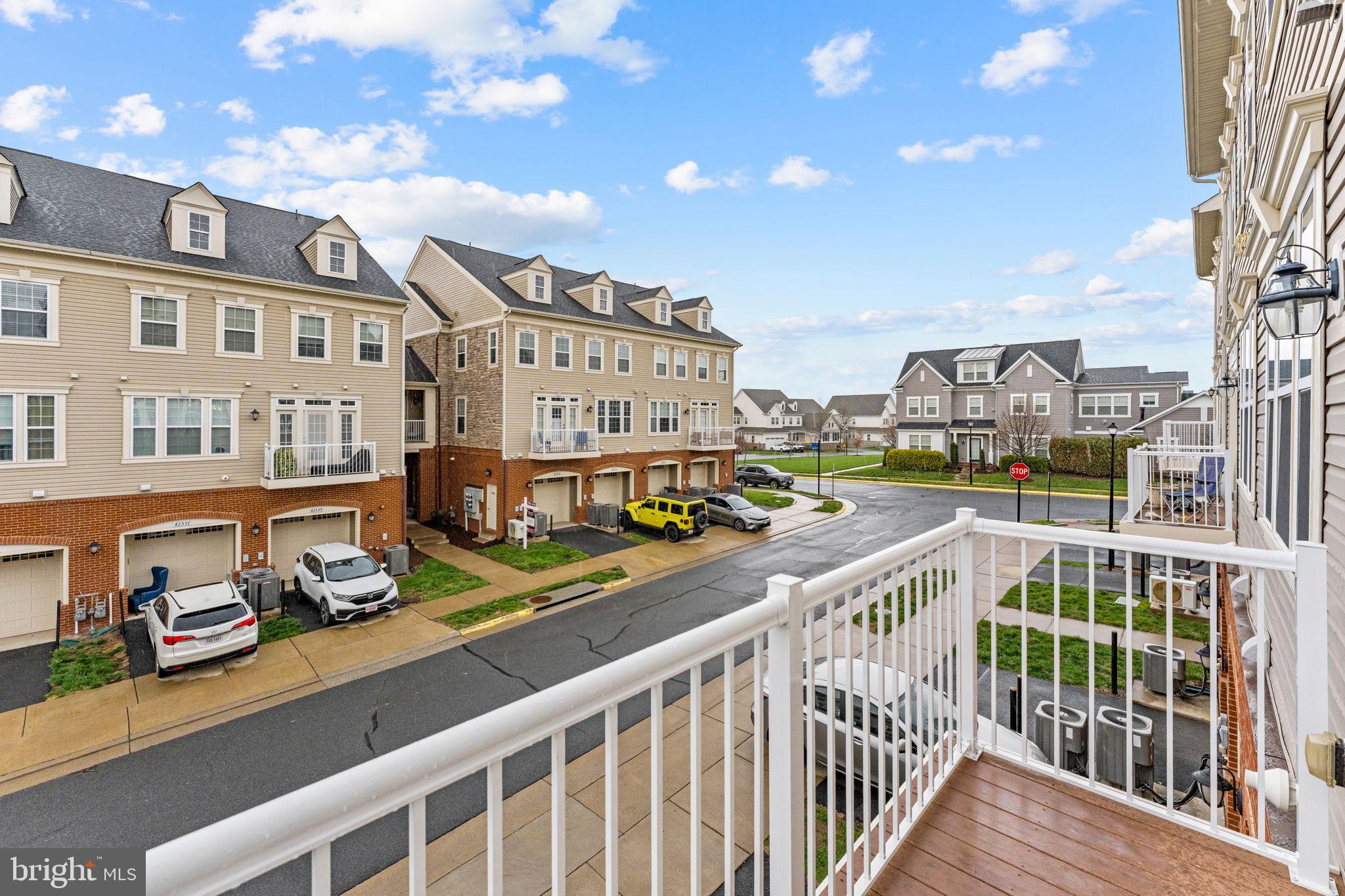 42558 Sunset Ridge Square Ashburn, VA 20148 - Photo 28 of 51 a view of a city from a balcony