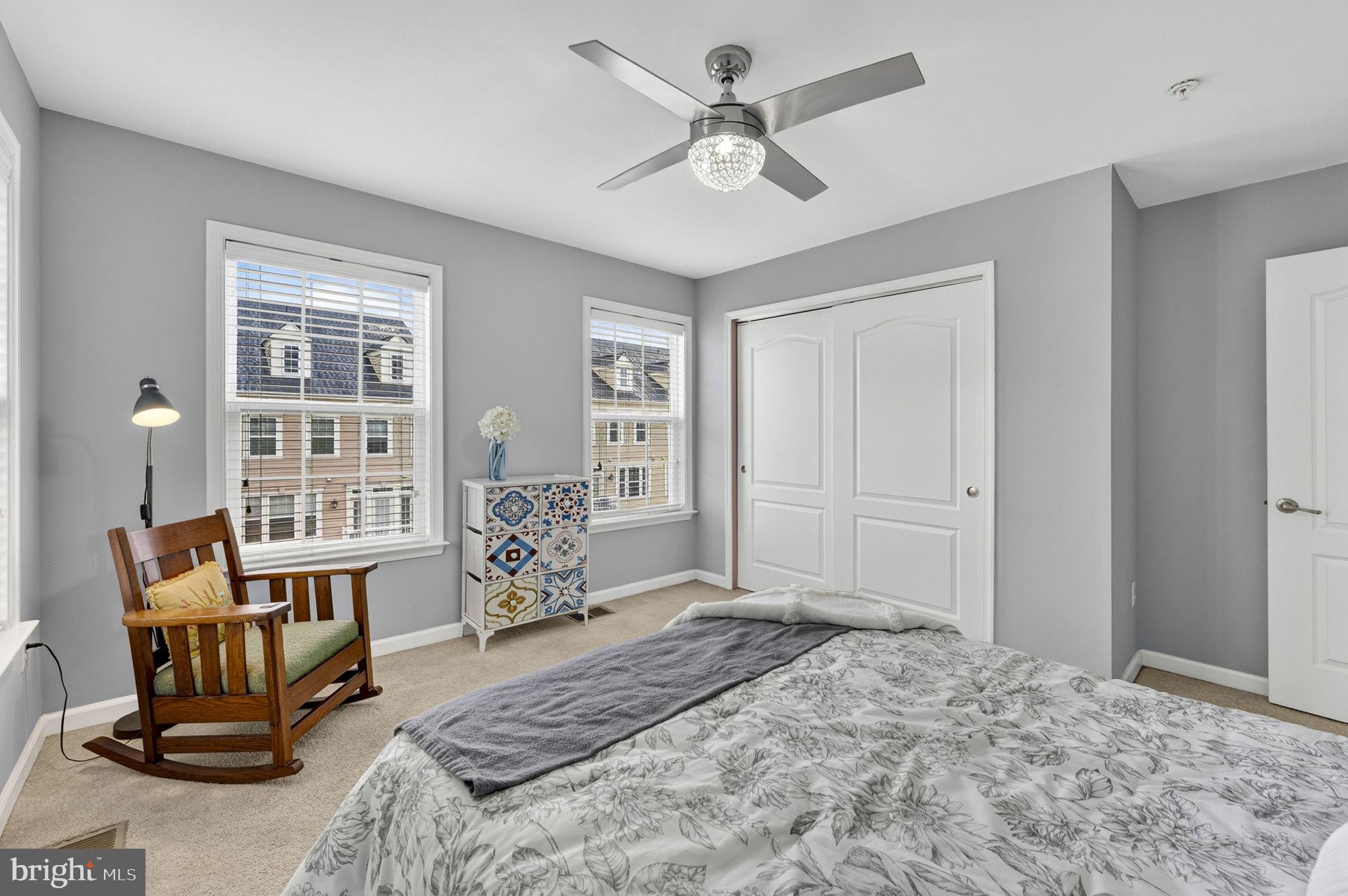 42558 Sunset Ridge Square Ashburn, VA 20148 - Photo 43 of 51 a bedroom with furniture and a large window