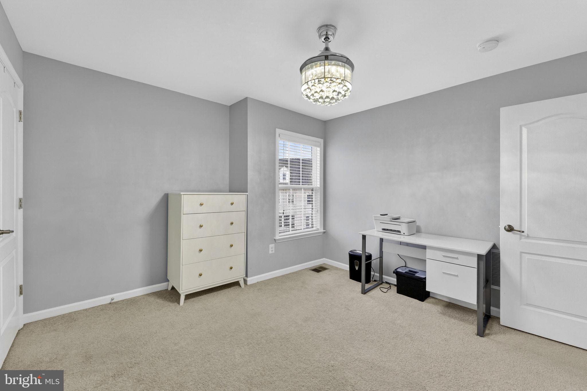 42558 Sunset Ridge Square Ashburn, VA 20148 - Photo 44 of 51 a view of a bedroom with furniture