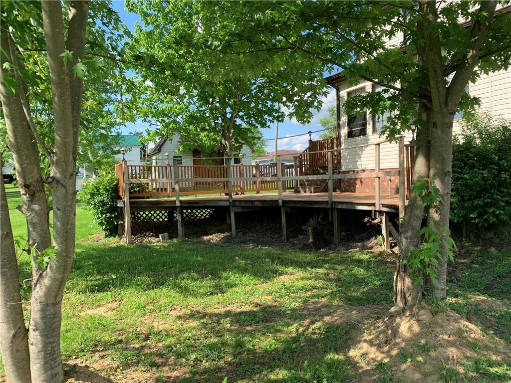 729 Cemetery Road Perryopolis, PA 15473 - Photo 4 of 24 a view of a house with a backyard