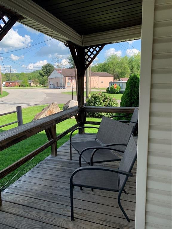 729 Cemetery Road Perryopolis, PA 15473 - Photo 6 of 24 a view of a bench in the deck