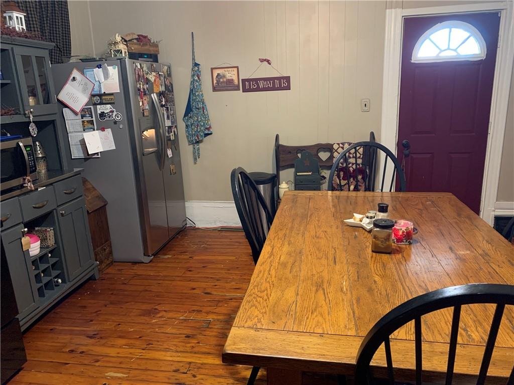 729 Cemetery Road Perryopolis, PA 15473 - Photo 9 of 24 a view of a dining room with furniture and chandelier