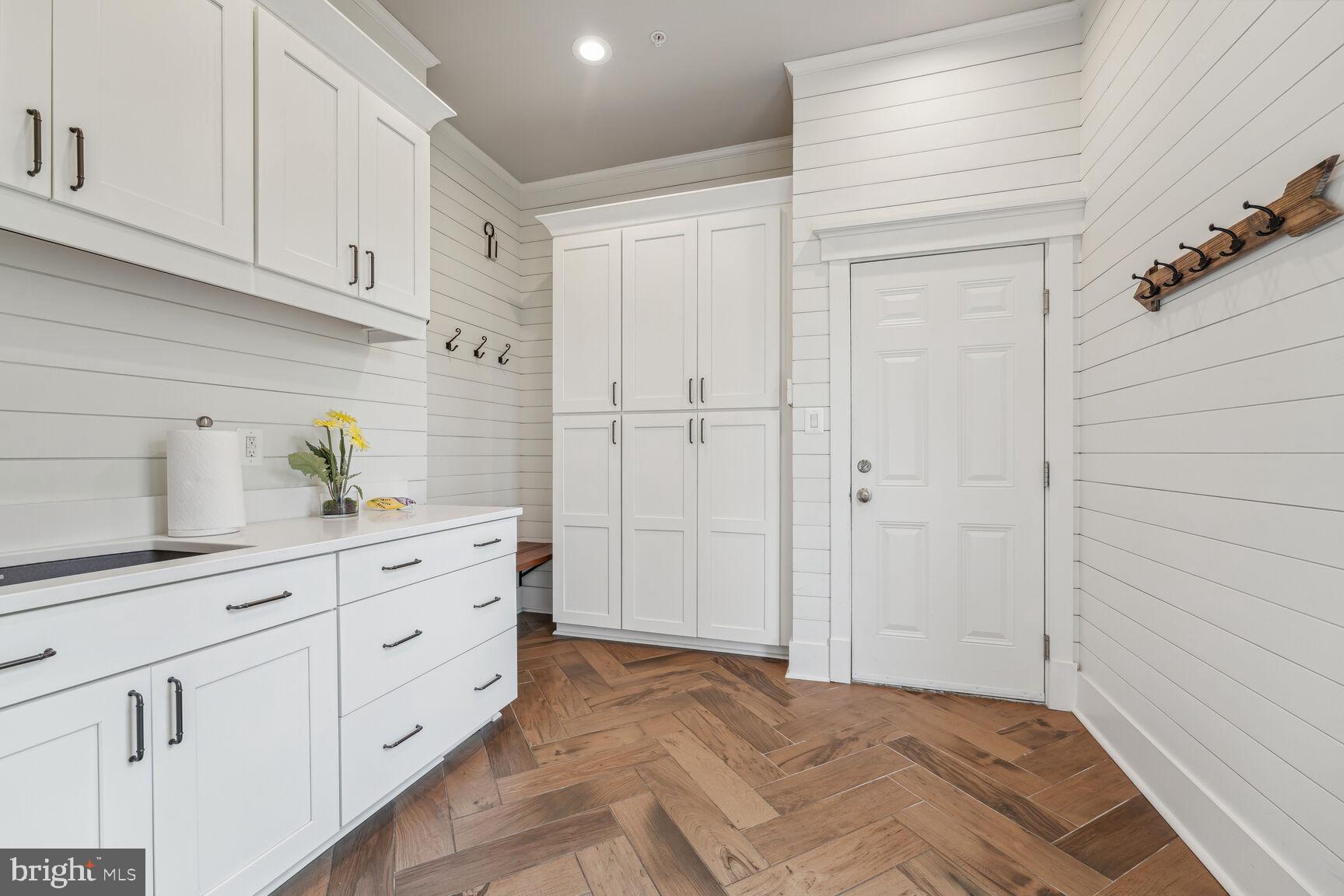 7708 Massena Road Bethesda, MD 20817 - Photo 13 of 78 HUGE mudroom, tile floors, sink, cabinets