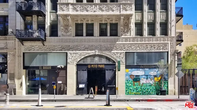 a view of a building with a entrance gate