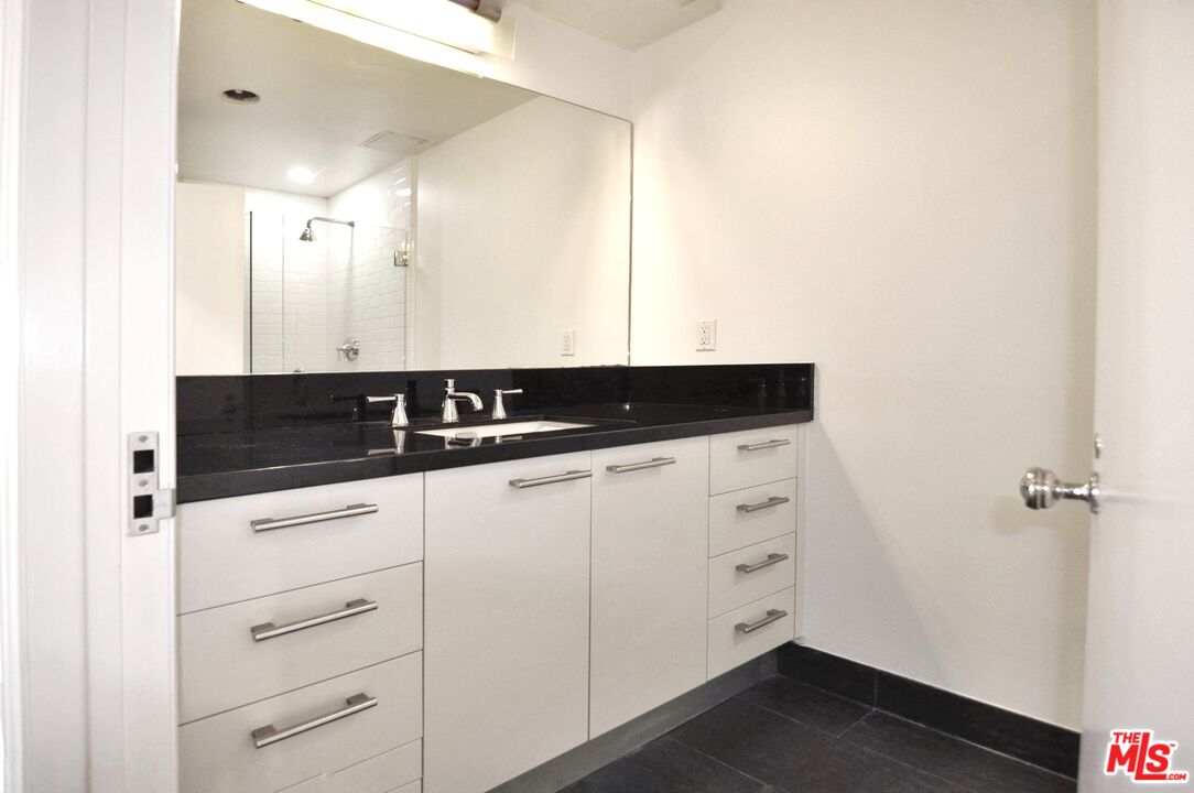 416 South Spring Street, Unit 805 Los Angeles, CA 90013 - Photo 7 of 24 a close view of a utility room with cabinets