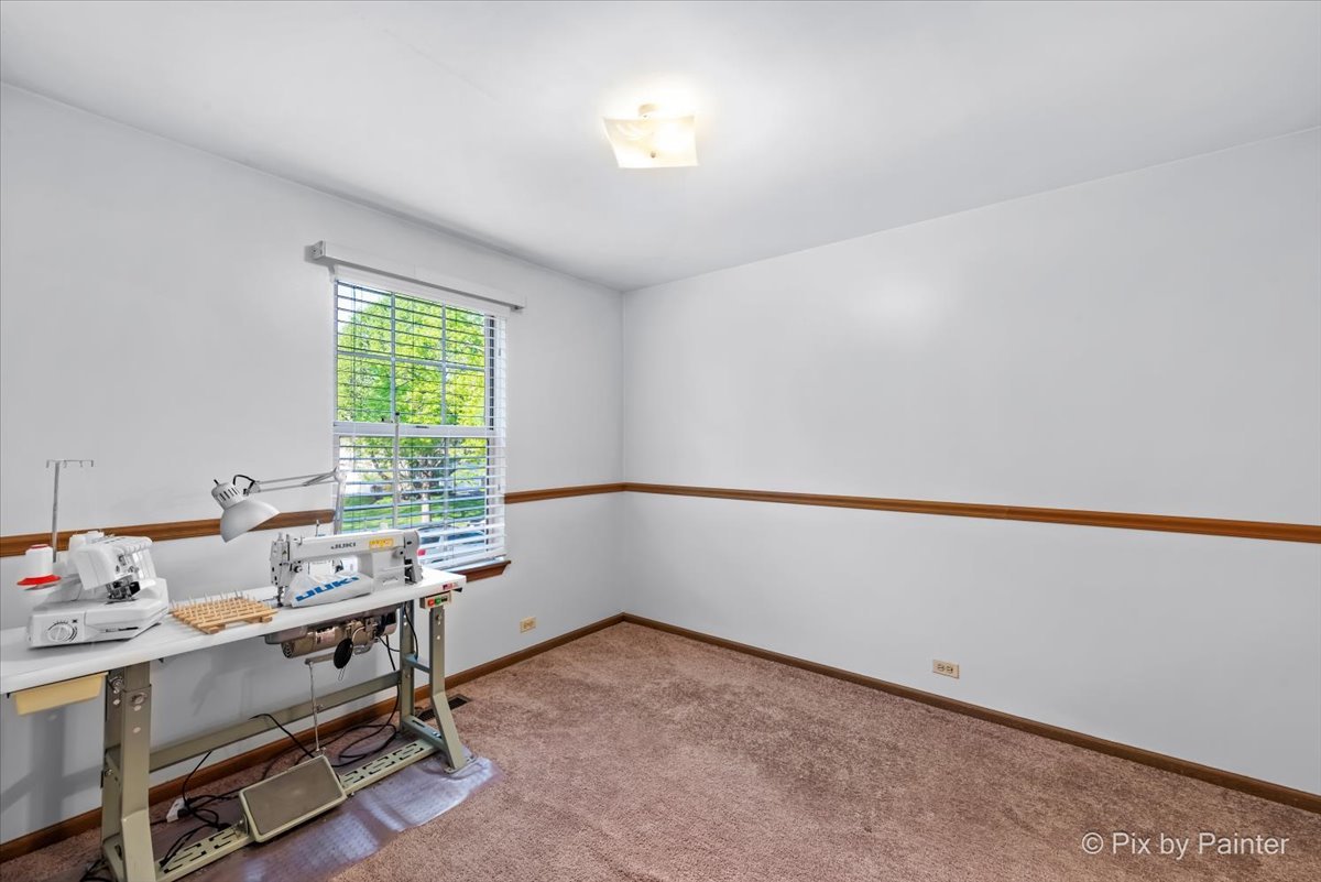 1664 Pebble Beach Circle Elgin, IL 60123 - Photo 11 of 24 a room with a window