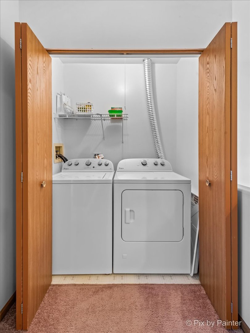 1664 Pebble Beach Circle Elgin, IL 60123 - Photo 19 of 24 a utility room with dryer and washer