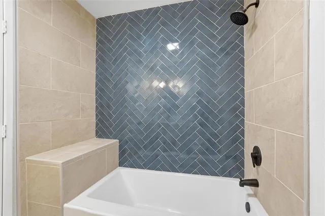 a bathroom with a bathtub