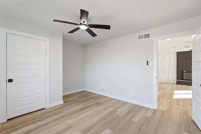 a view of a livingroom with wooden floor