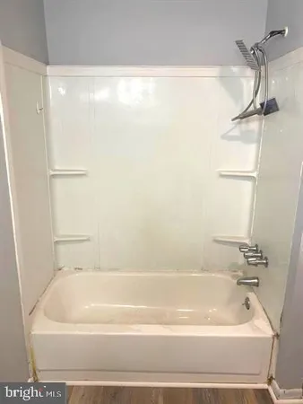 a bathroom with a bathtub