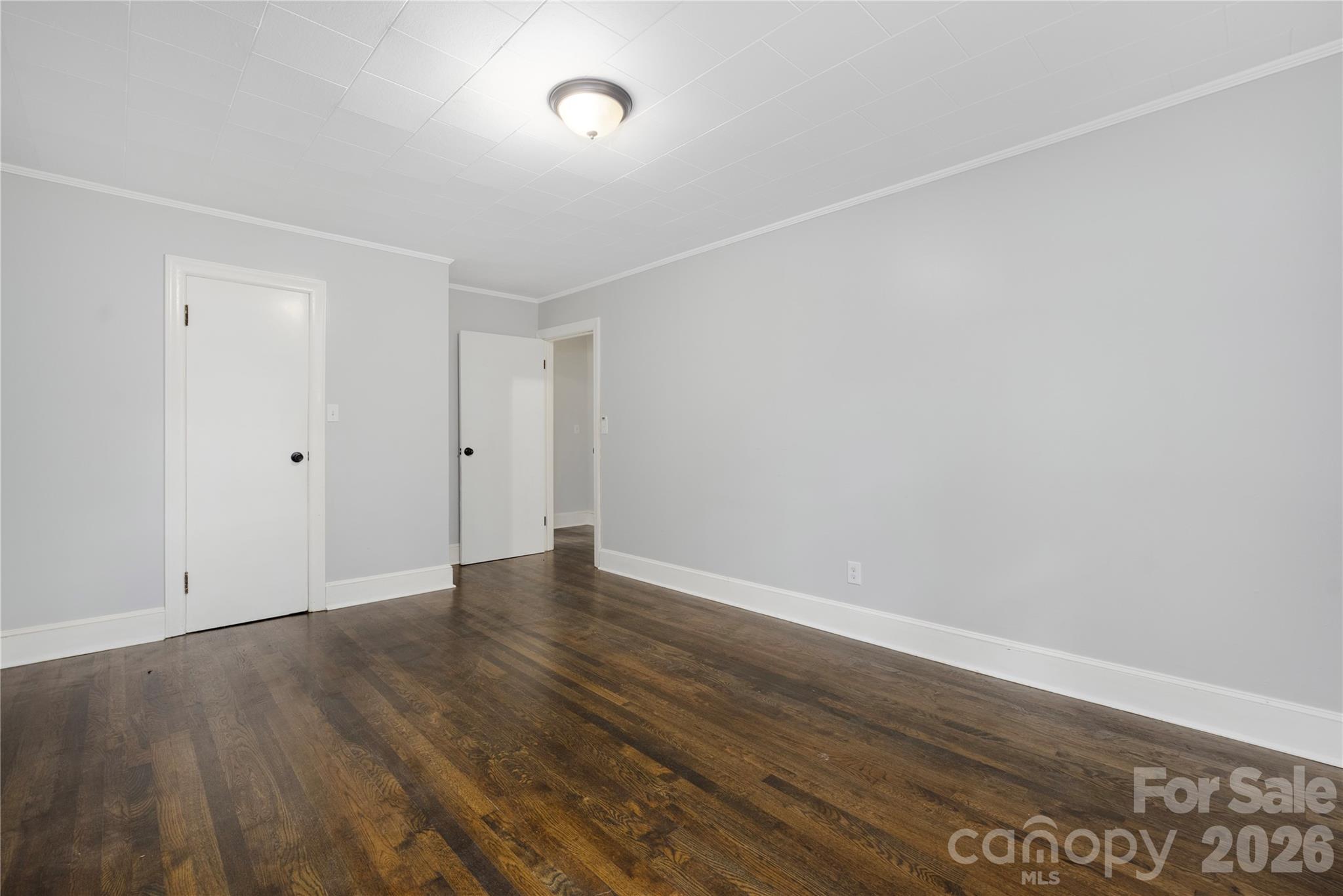 146 Staton Road Gastonia, NC 28056 - Photo 16 of 25 a view of an empty room with wooden floor