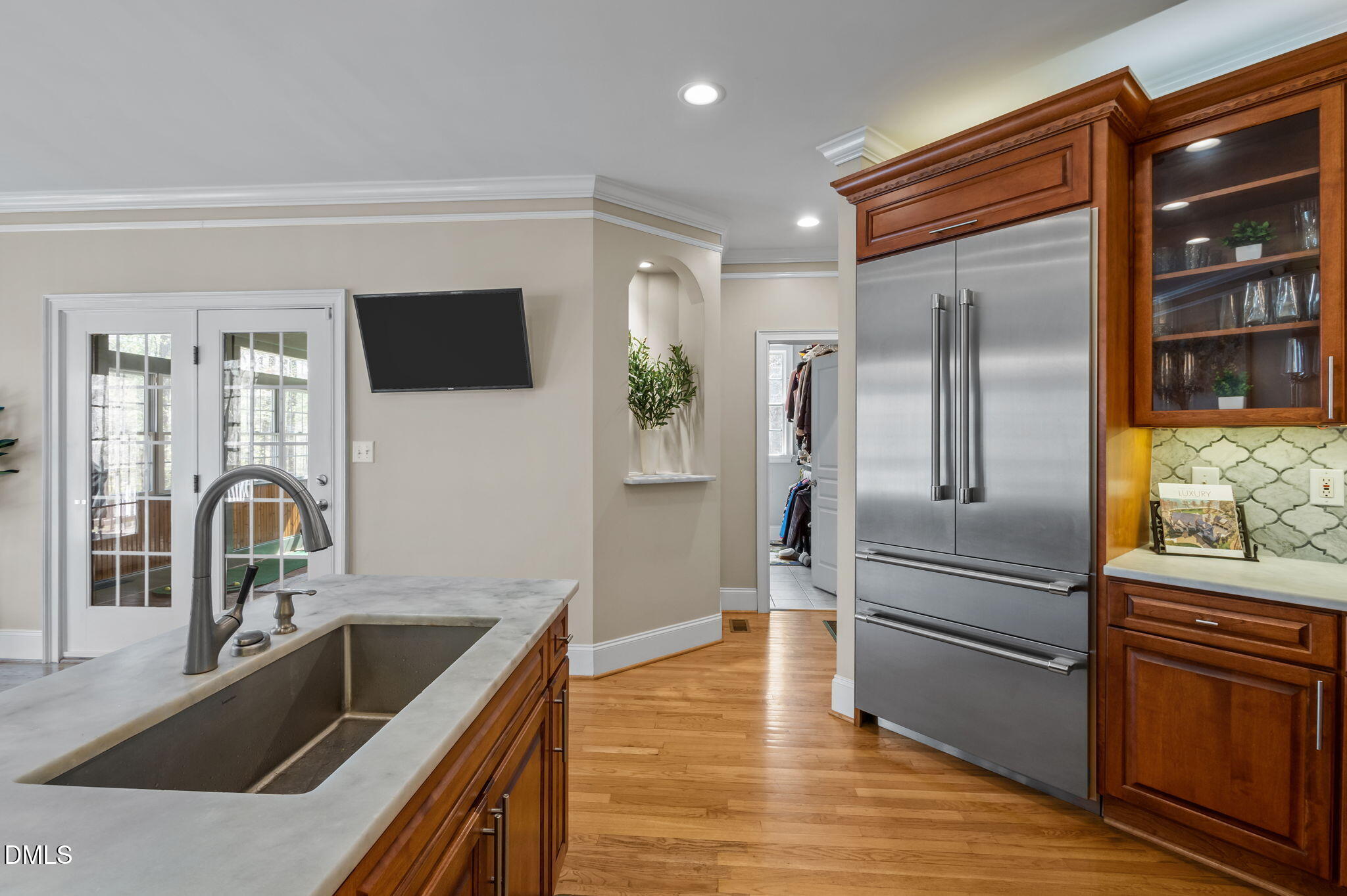 825 Oxbow Crossing Road Chapel Hill, NC 27516 - Photo 13 of 86 a kitchen with granite countertop a refrigerator and a sink