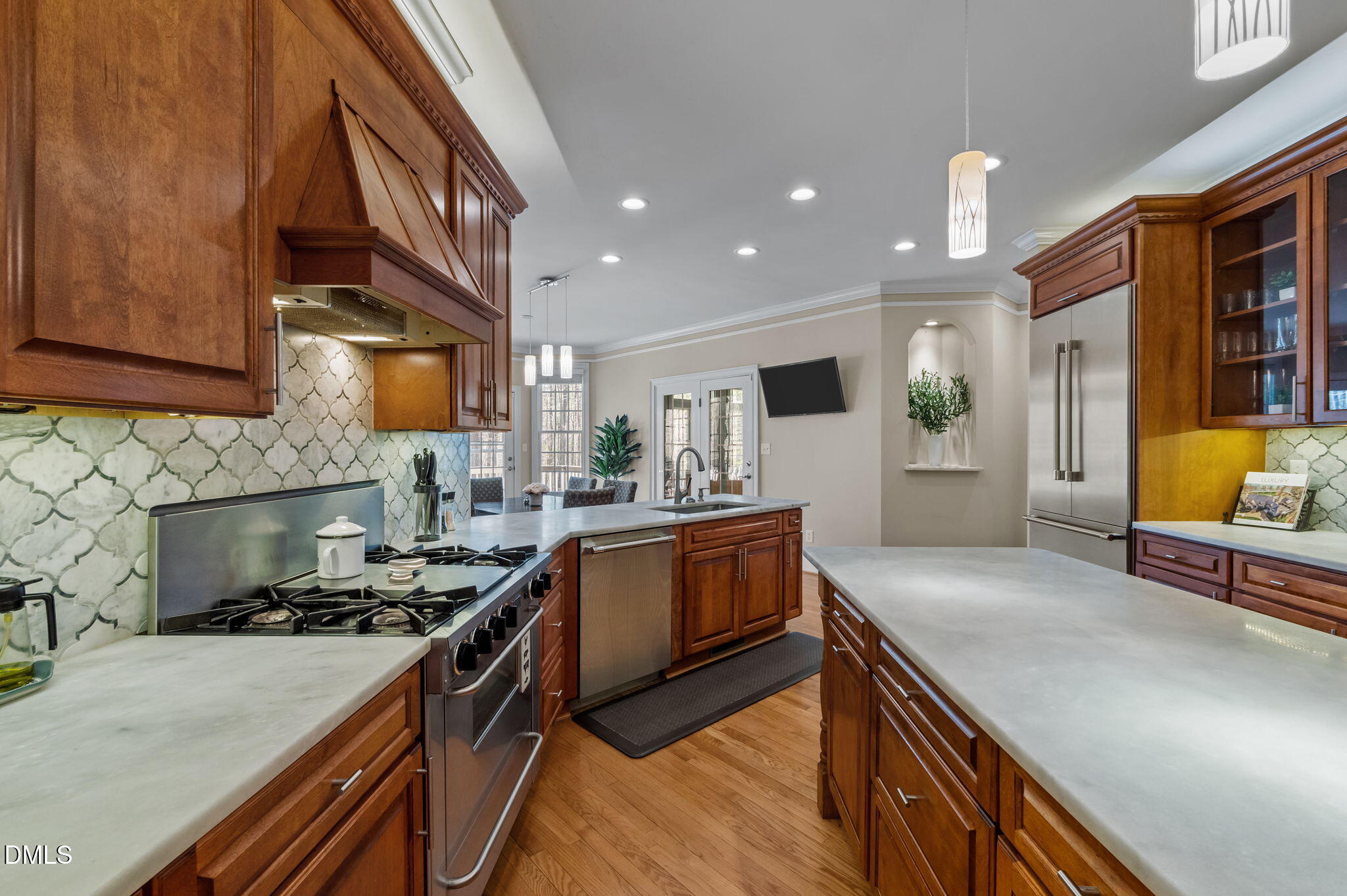 825 Oxbow Crossing Road Chapel Hill, NC 27516 - Photo 15 of 86 a kitchen with stainless steel appliances granite countertop sink stove and cabinets