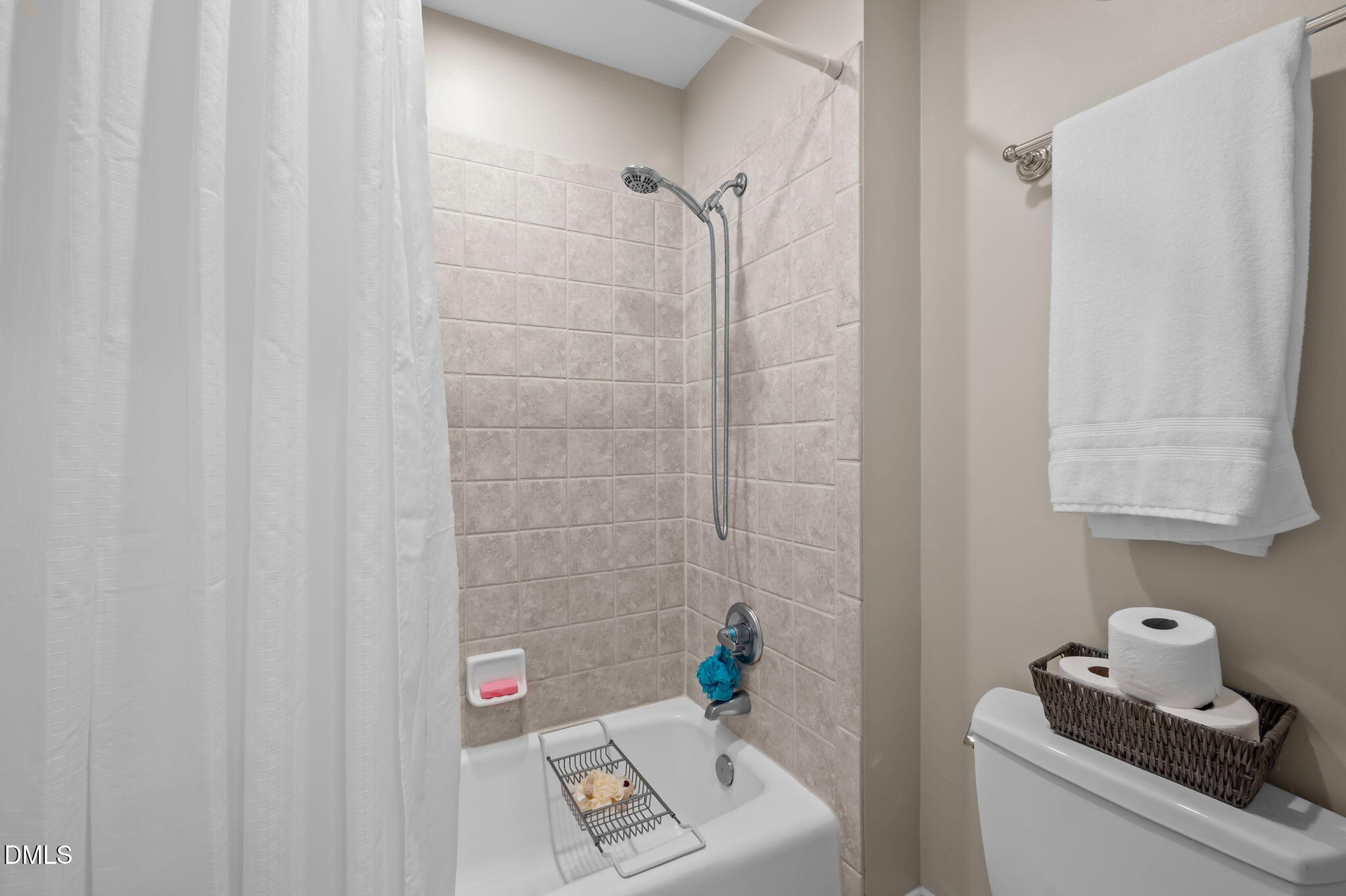825 Oxbow Crossing Road Chapel Hill, NC 27516 - Photo 31 of 86 a bathroom with a shower curtain and a window
