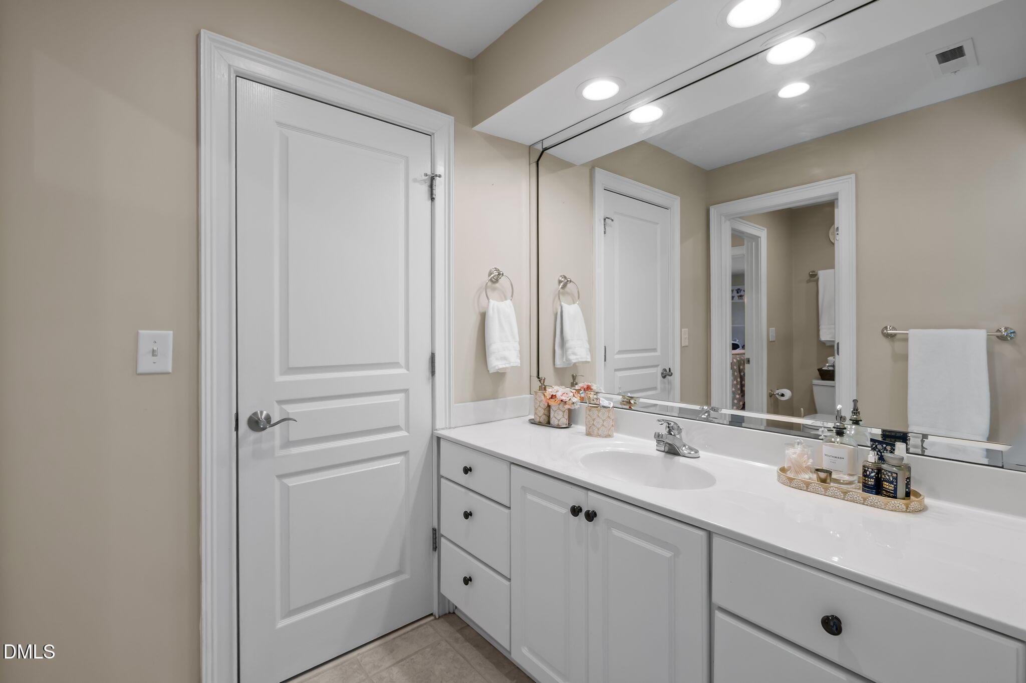 825 Oxbow Crossing Road Chapel Hill, NC 27516 - Photo 38 of 86 a bathroom with a sink and a mirror