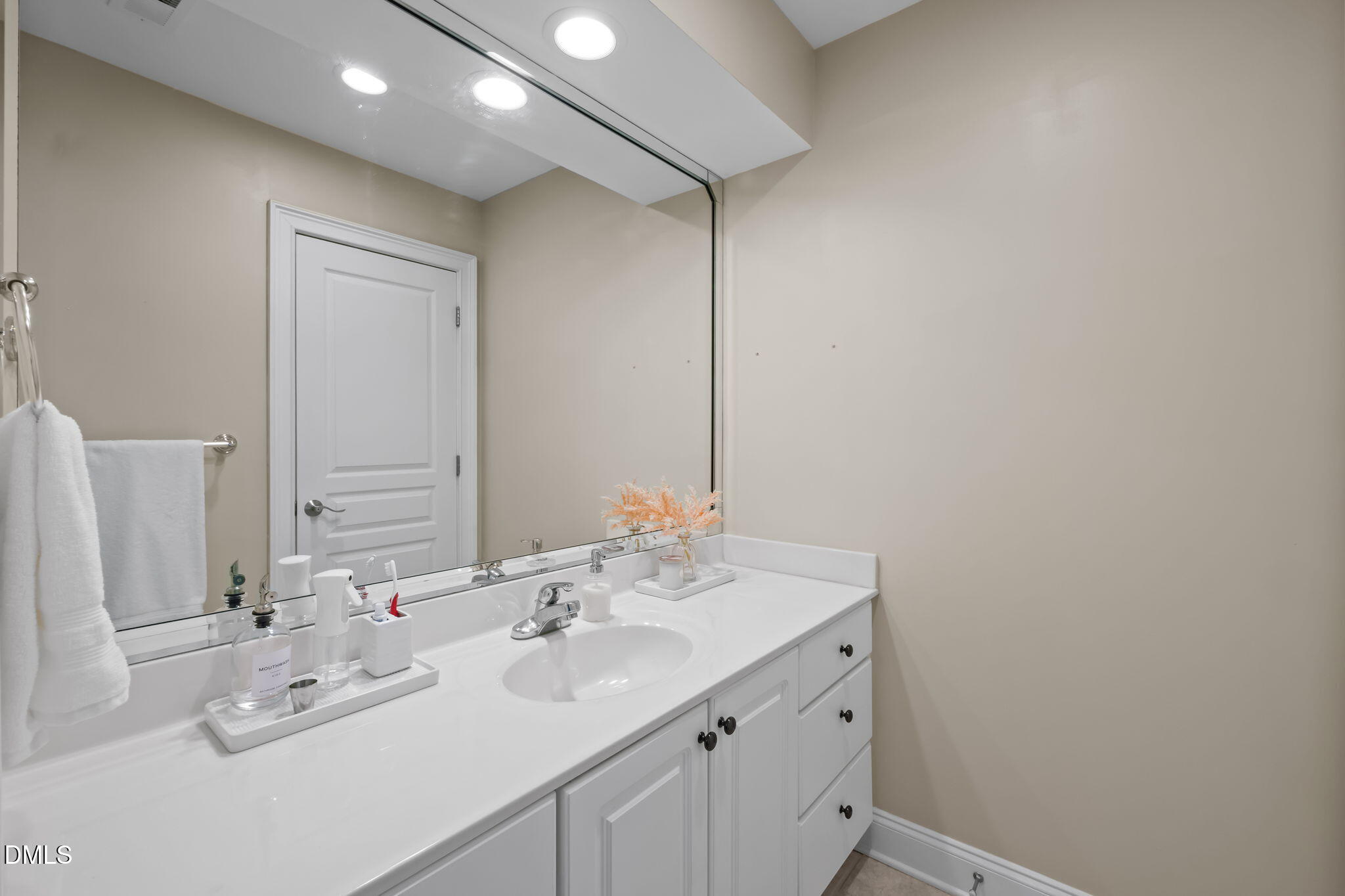 825 Oxbow Crossing Road Chapel Hill, NC 27516 - Photo 40 of 86 a bathroom with a sink and a mirror