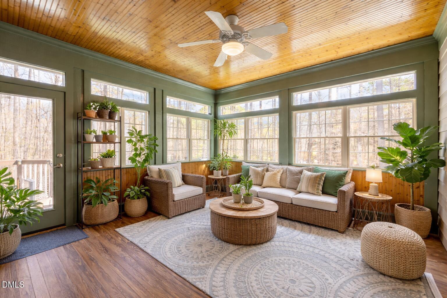 825 Oxbow Crossing Road Chapel Hill, NC 27516 - Photo 41 of 86 a living room with furniture and a potted plant