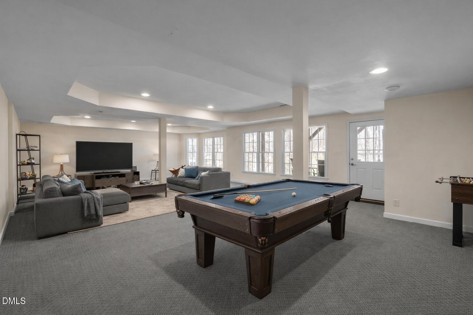 825 Oxbow Crossing Road Chapel Hill, NC 27516 - Photo 44 of 86 a living room with furniture pool table and flat screen tv