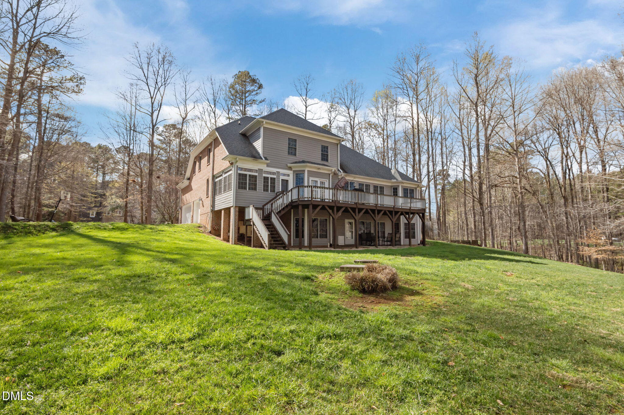 825 Oxbow Crossing Road Chapel Hill, NC 27516 - Photo 56 of 86 a view of a big house with a big yard and large trees