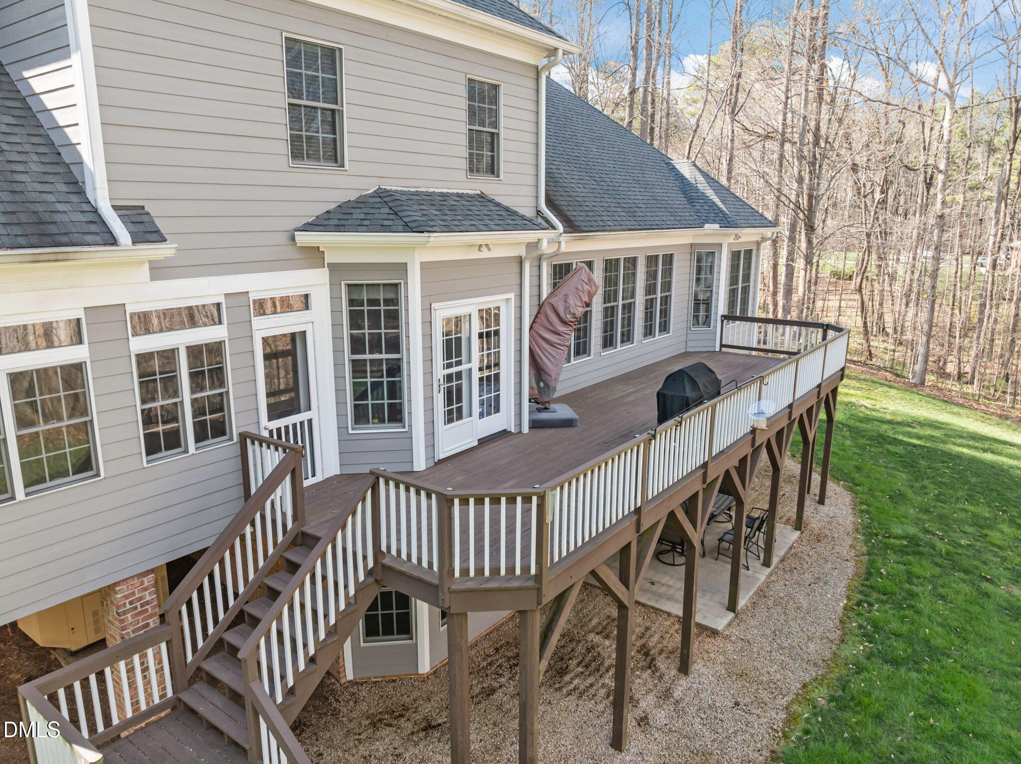 825 Oxbow Crossing Road Chapel Hill, NC 27516 - Photo 59 of 86 a view of a house with a deck and a yard