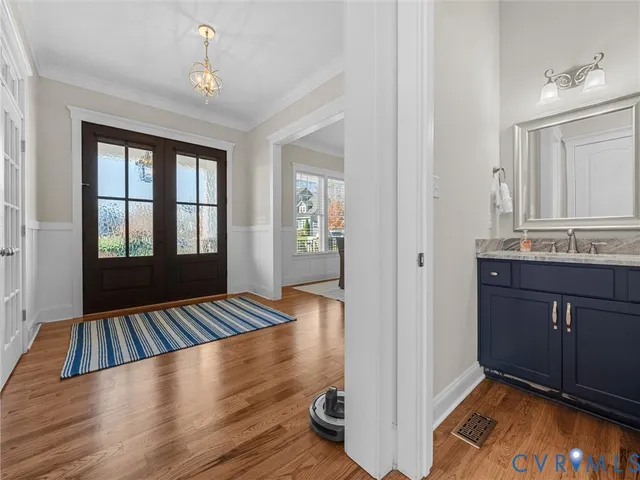 a bedroom with a bed and a table