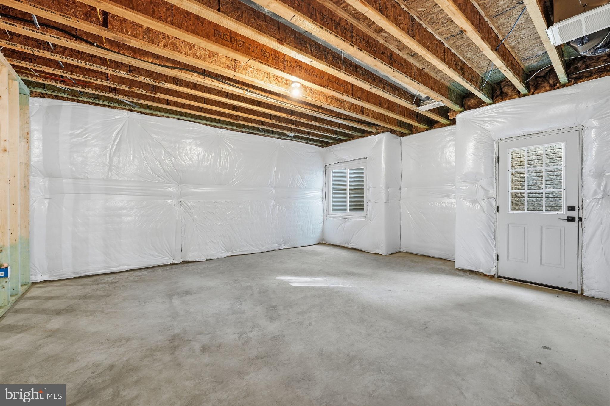 18871 Woodburn Road Leesburg, VA 20175 - Photo 68 of 89 Unfinished basement with bathroom rough-in