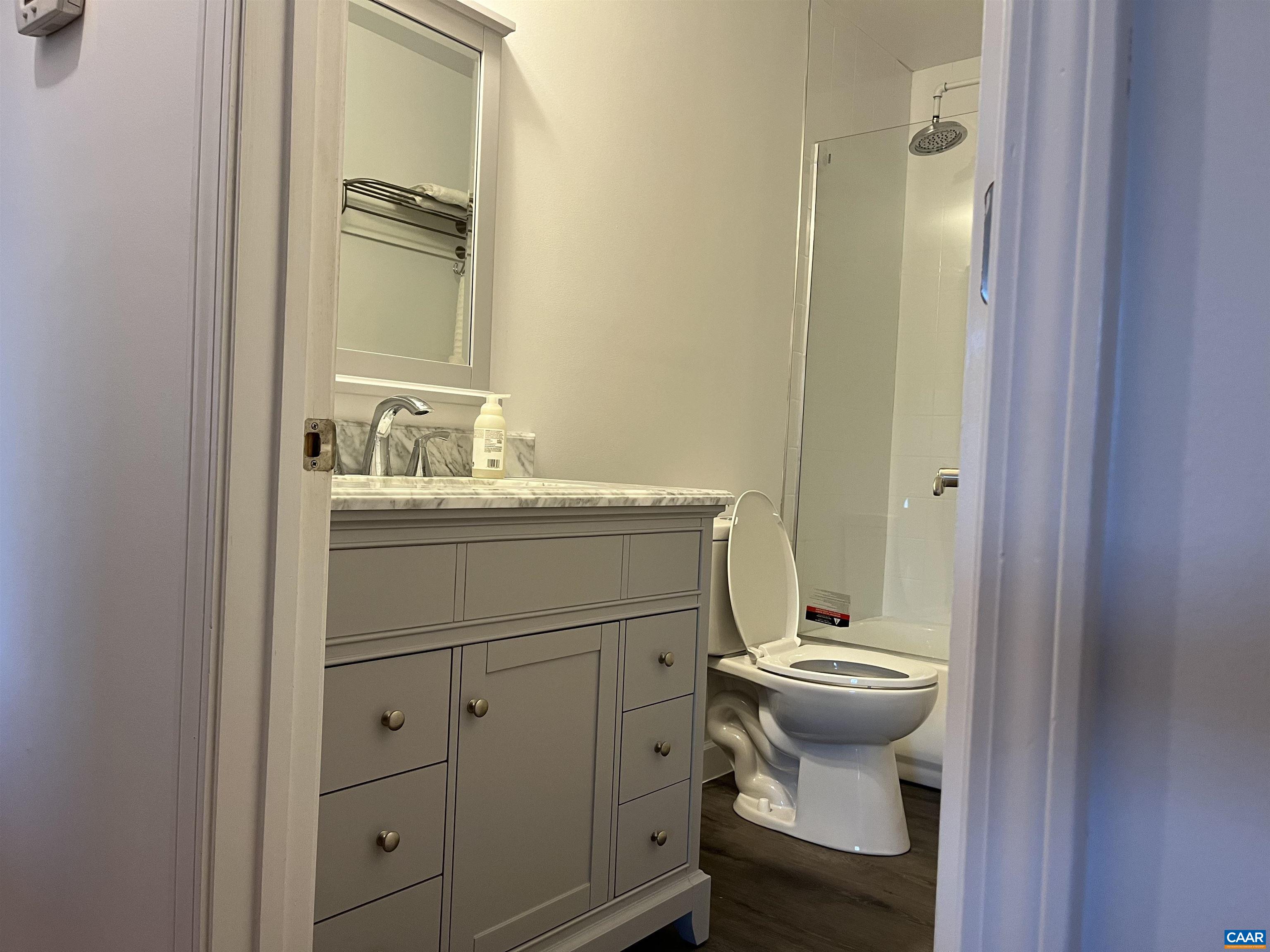 2150 Stony Point Road Charlottesville, VA 22911 - Photo 23 of 40 a bathroom with a sink toilet and vanity