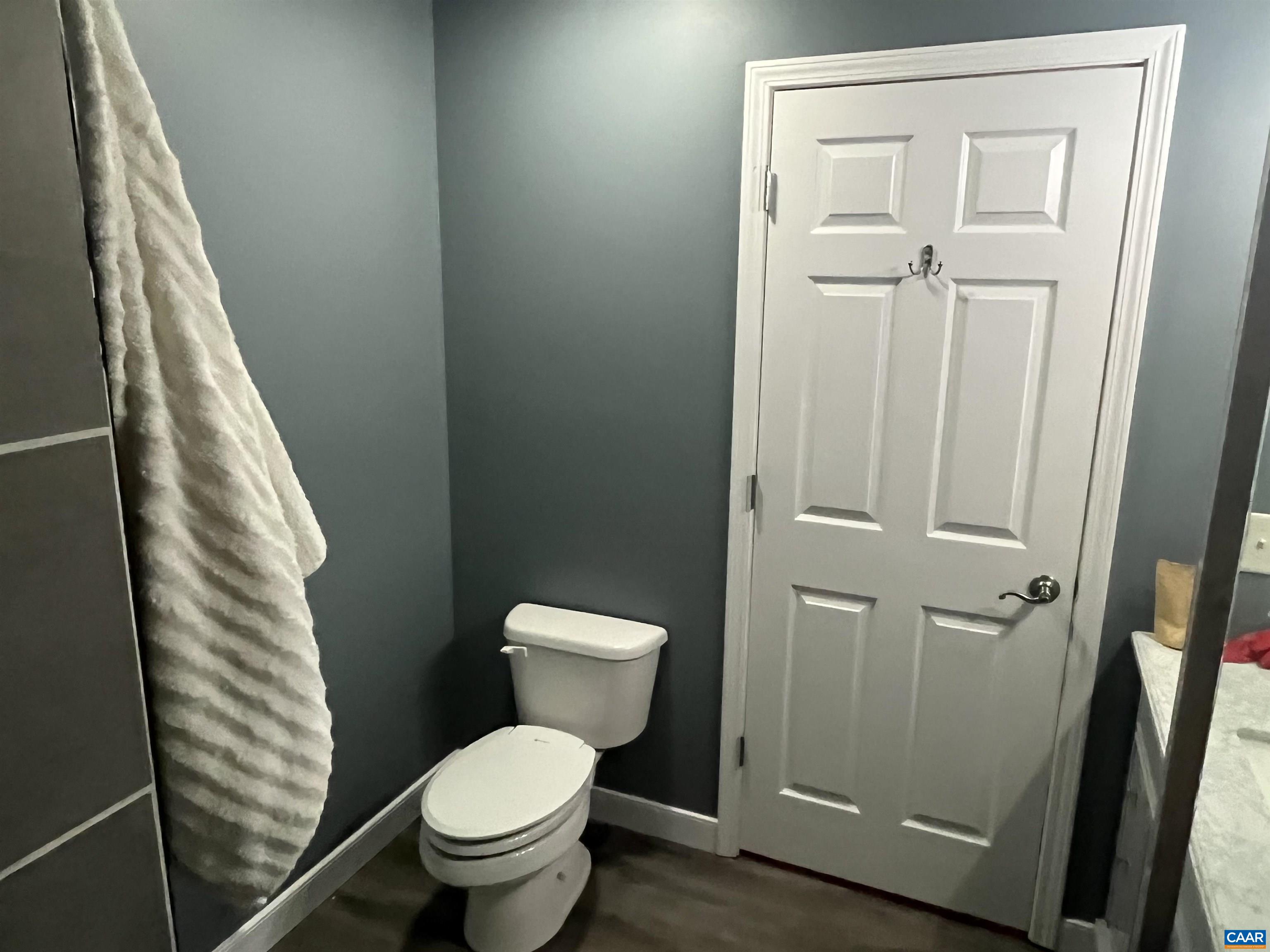 2150 Stony Point Road Charlottesville, VA 22911 - Photo 8 of 40 a white toilet sitting next to a shower