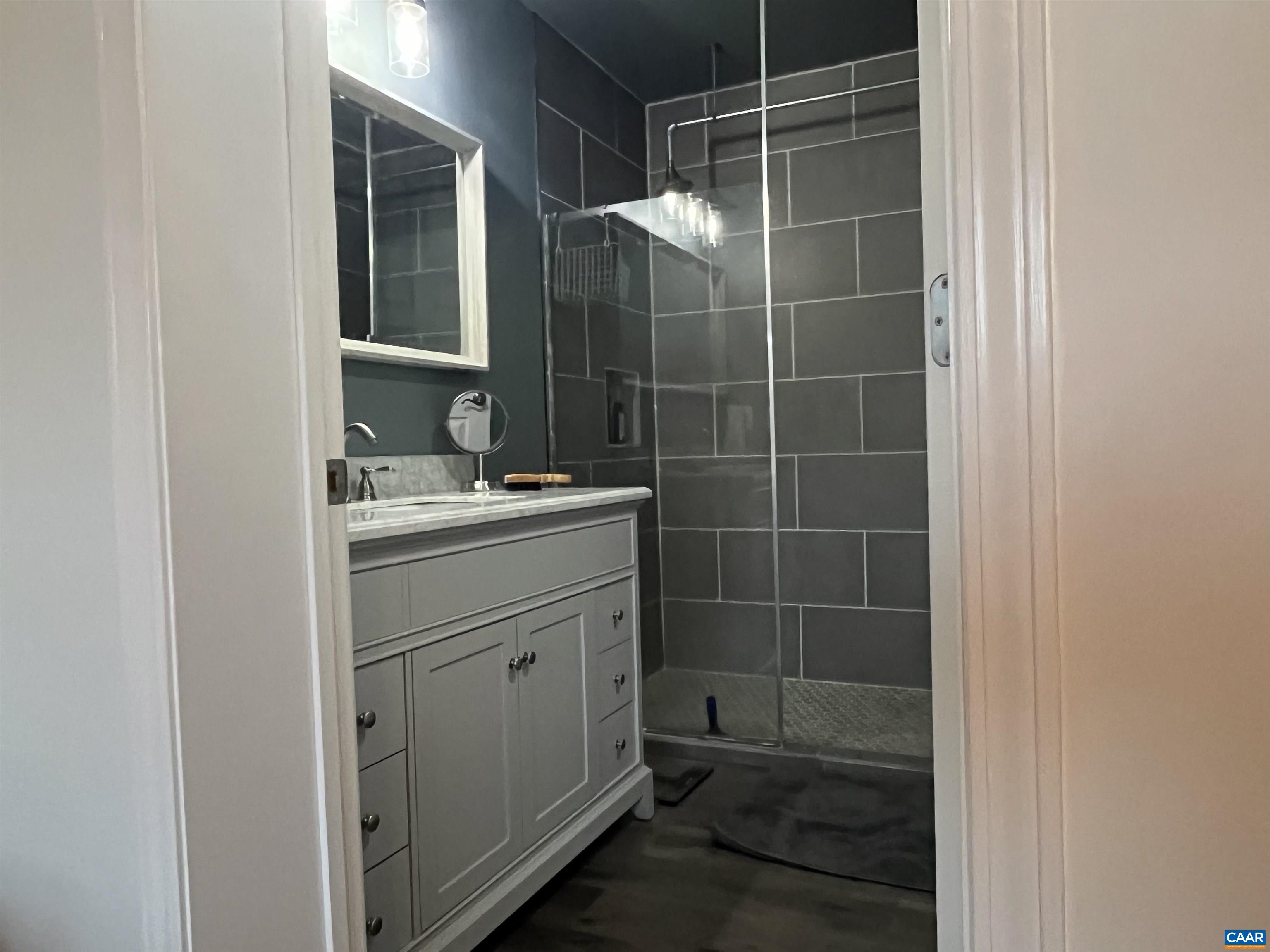 2150 Stony Point Road Charlottesville, VA 22911 - Photo 10 of 40 a bathroom with a sink toilet and shower