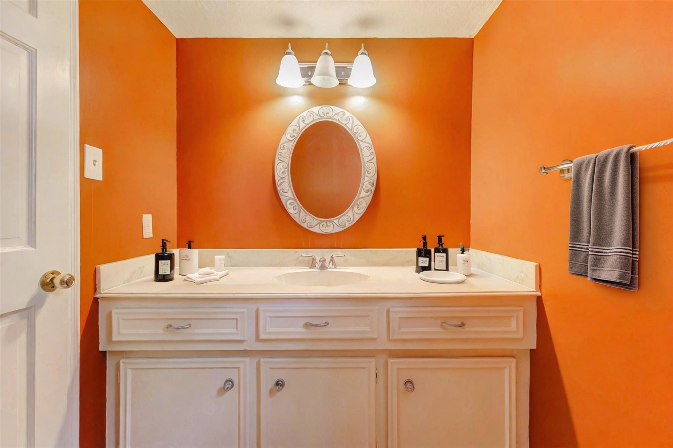18103 Ravenfield Drive Houston, TX 77084 - Photo 21 of 36 a bathroom with a sink and a mirror