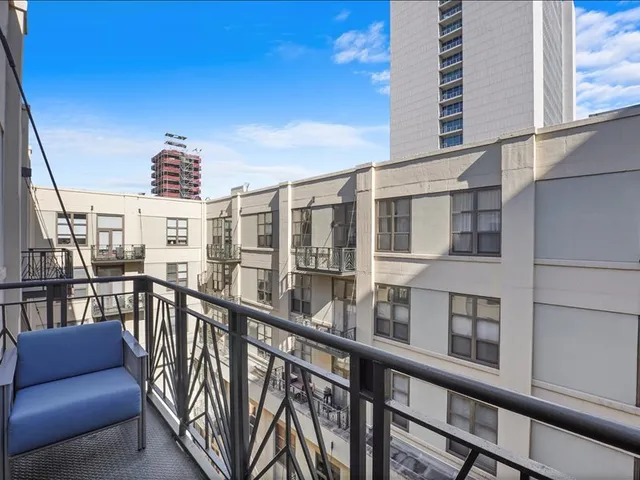 a view of a building from a balcony