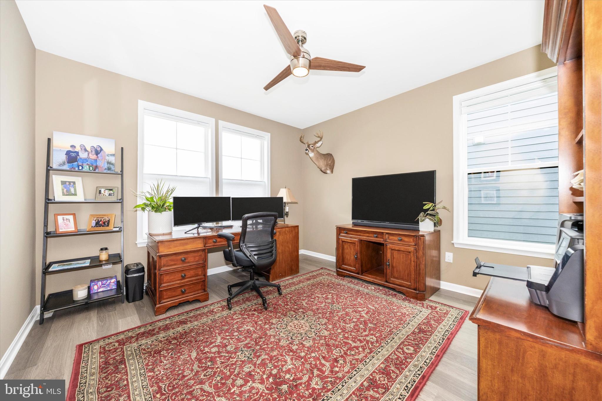 700 Bond Street Frederick, MD 21701 - Photo 15 of 49 a living room with furniture and a flat screen tv