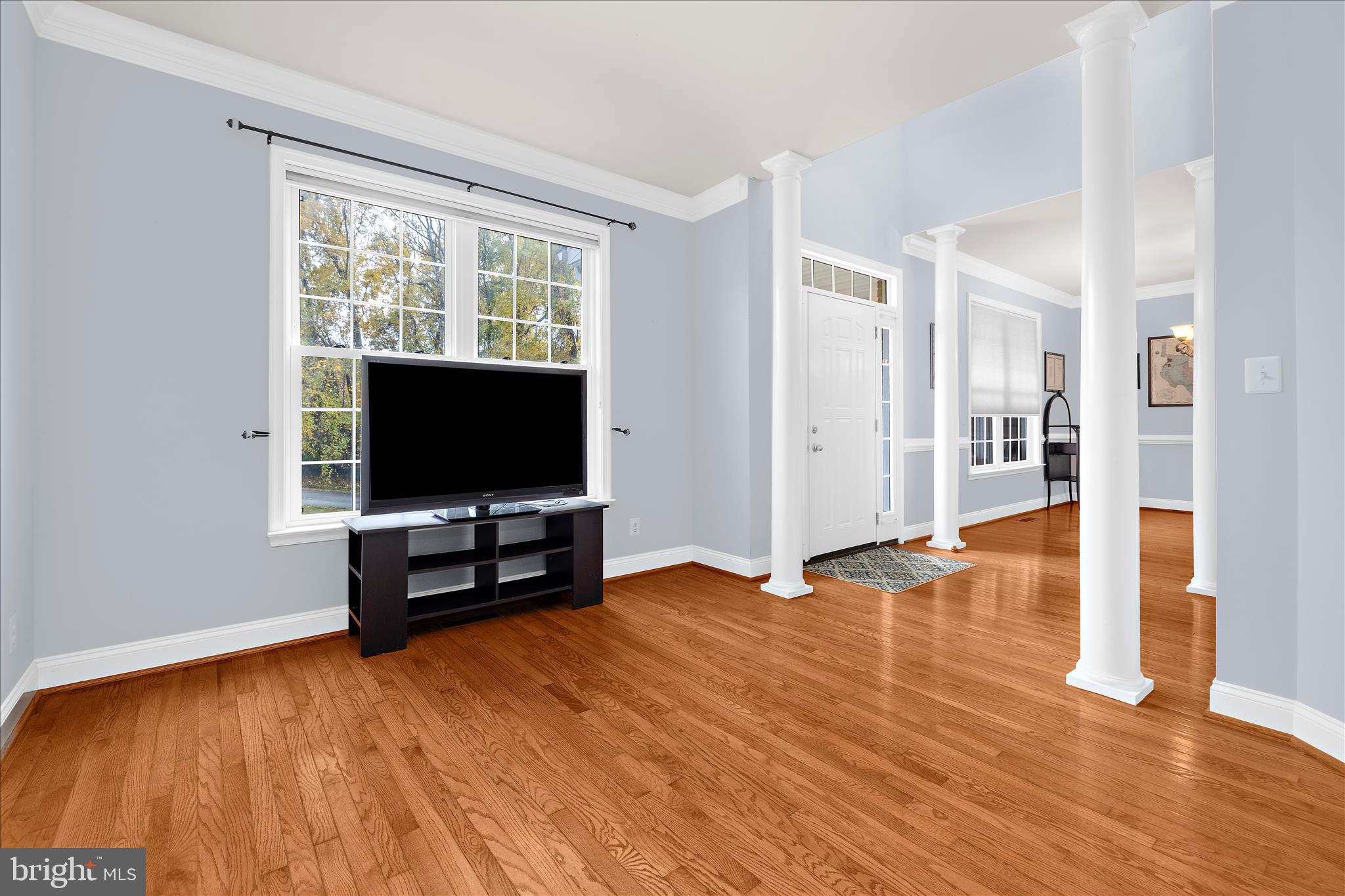 211 Still Water Lane Huntingtown, MD 20639 - Photo 13 of 87 a living room with furniture and a flat screen tv