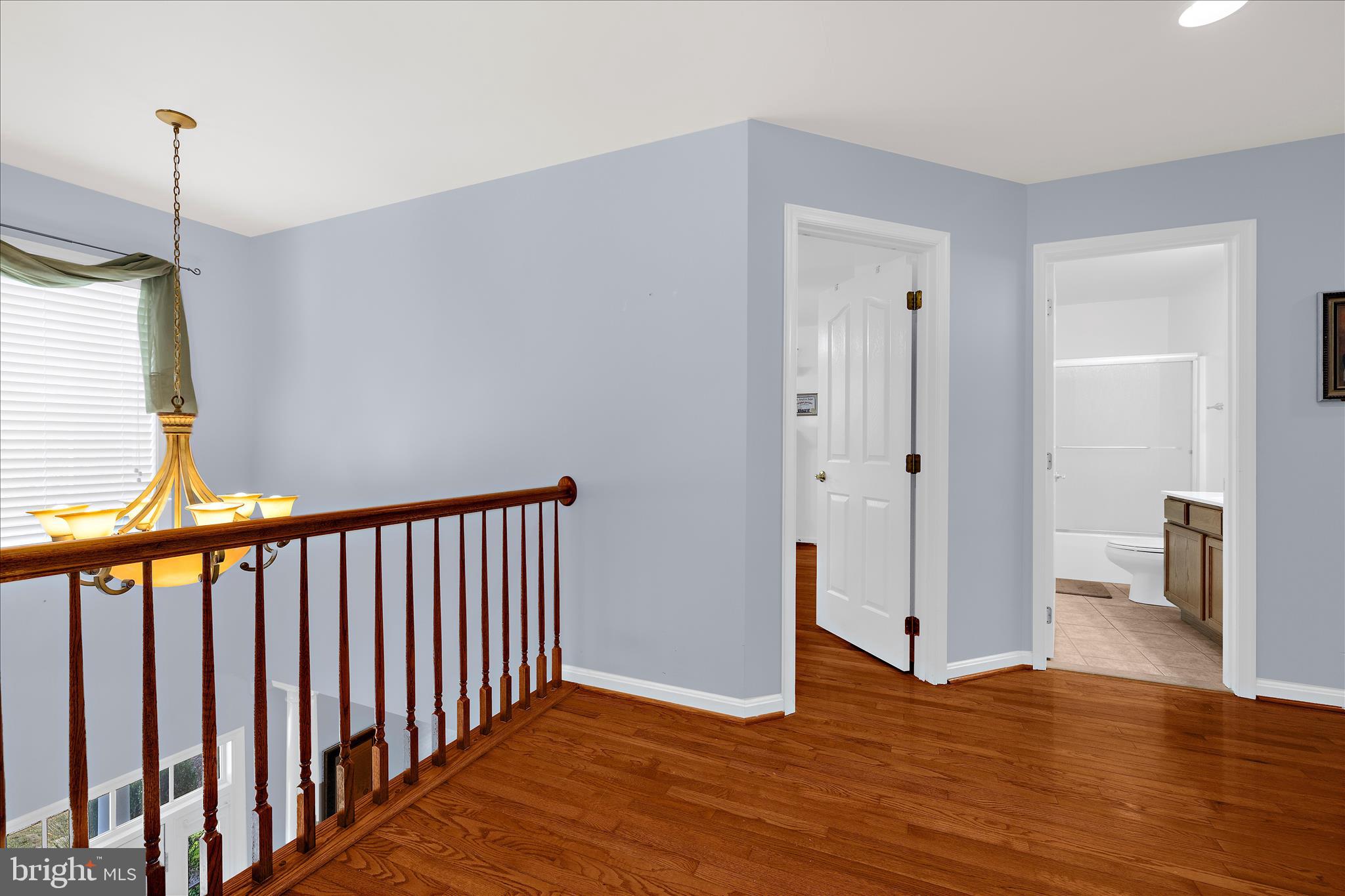 211 Still Water Lane Huntingtown, MD 20639 - Photo 35 of 87 a view of empty room with wooden floor and fan