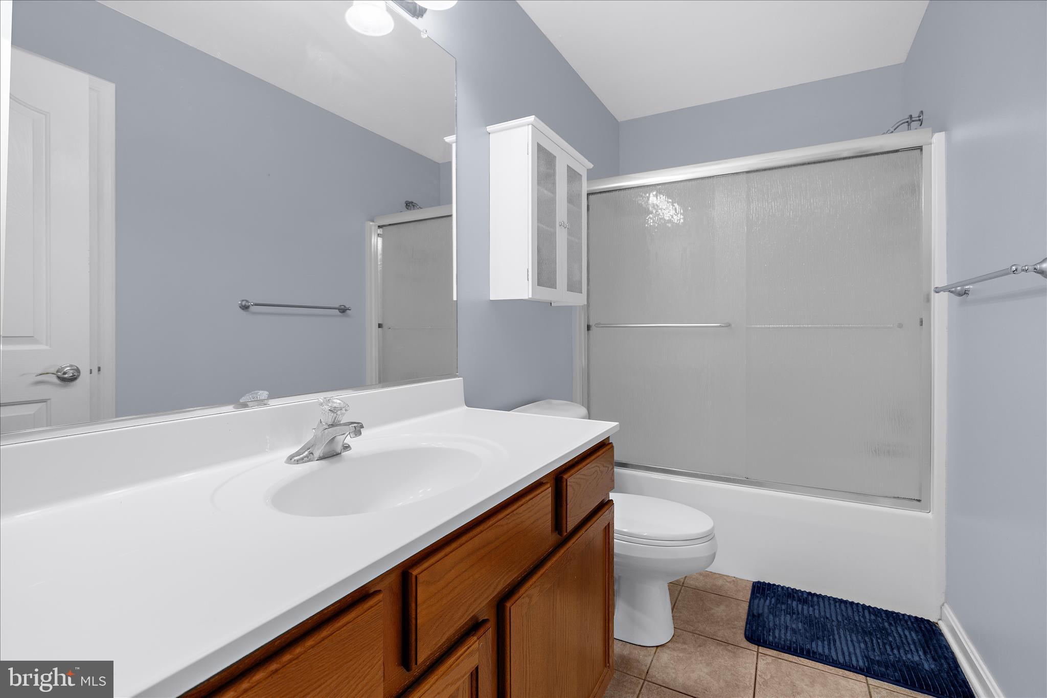 211 Still Water Lane Huntingtown, MD 20639 - Photo 41 of 87 a bathroom with a sink a toilet and shower