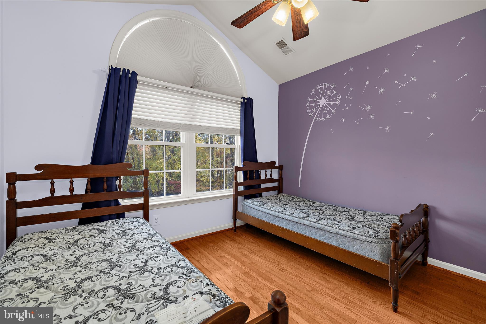 211 Still Water Lane Huntingtown, MD 20639 - Photo 55 of 87 a bedroom with furniture and a large window