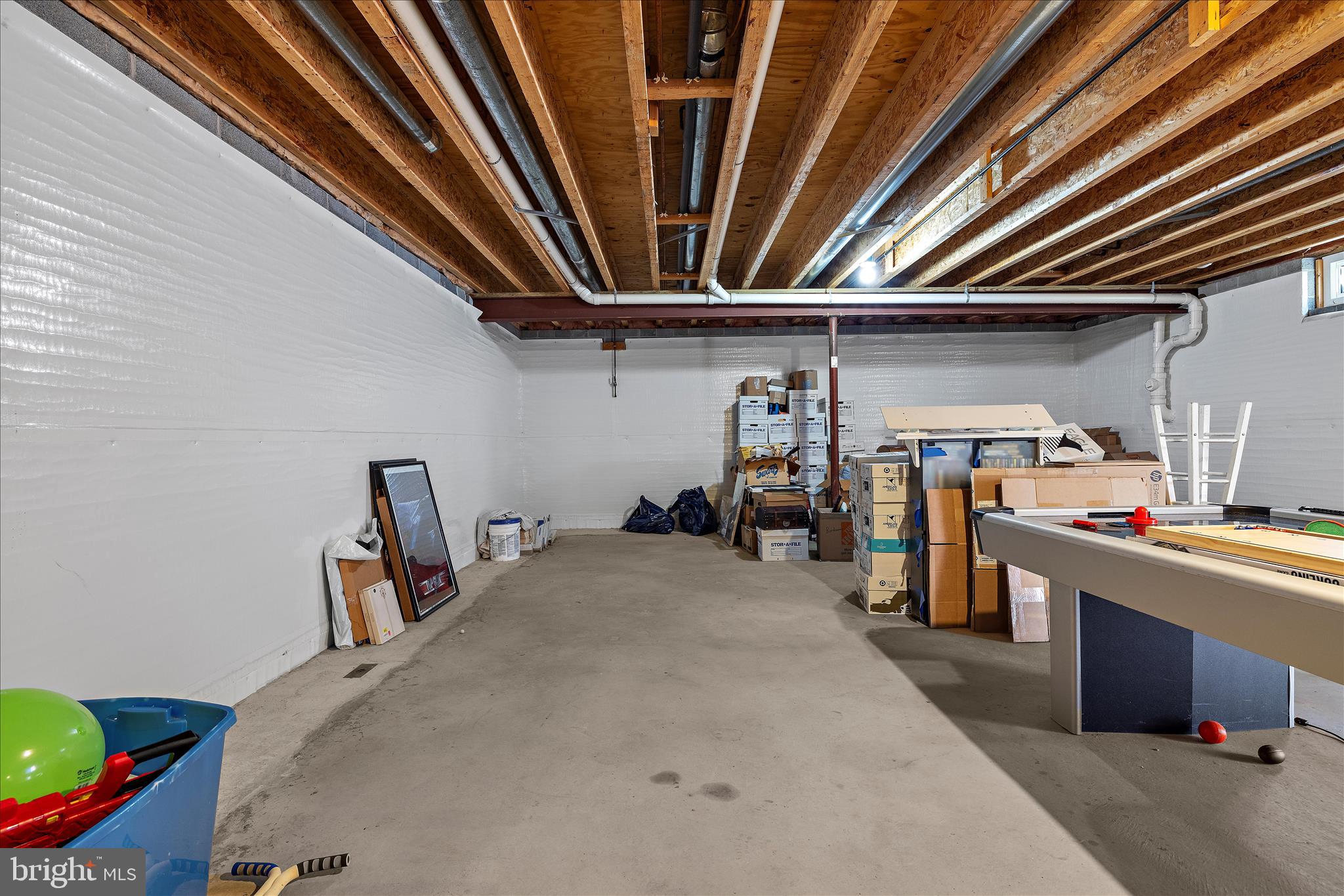 211 Still Water Lane Huntingtown, MD 20639 - Photo 60 of 87 a view of storage and utility room