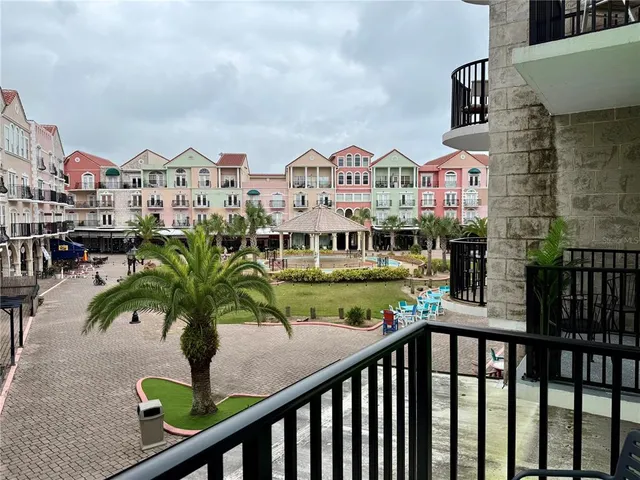 a view of houses with an outdoor space and lakeside