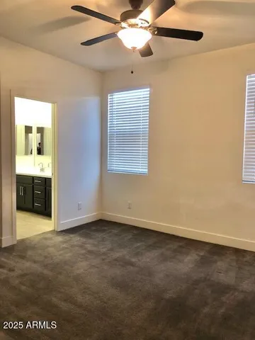 a bathroom with a sink double vanity and a mirror