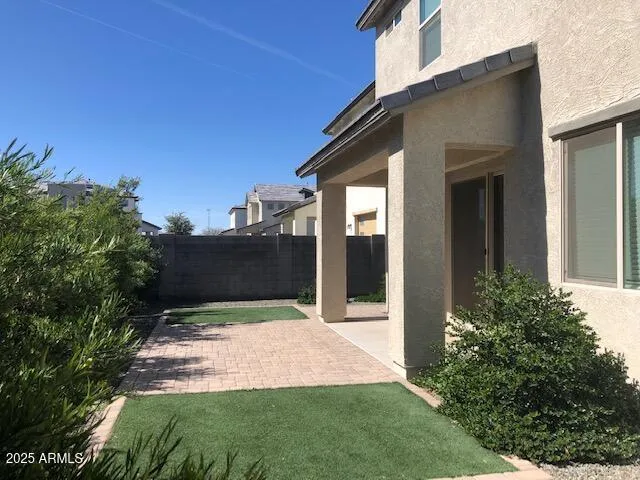 a view of a back yard of the house