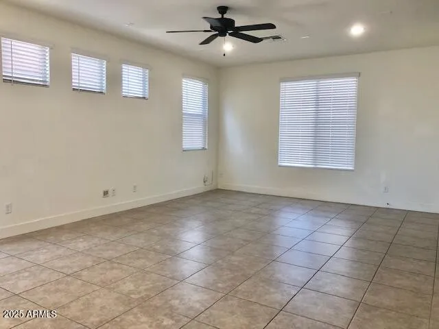 a view of open kitchen with a sink and a living room