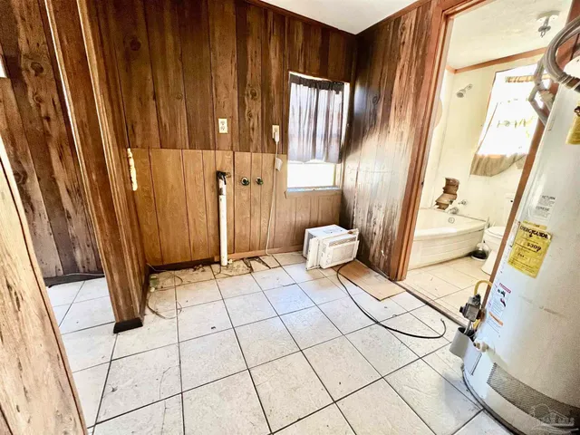 a view of a porch with wooden floor and stairs