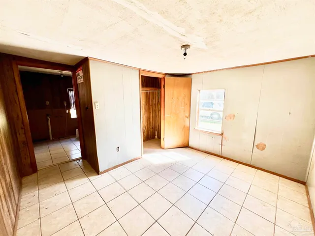 a view of a livingroom with a large window