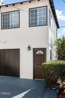 aerial view of a house with a garden