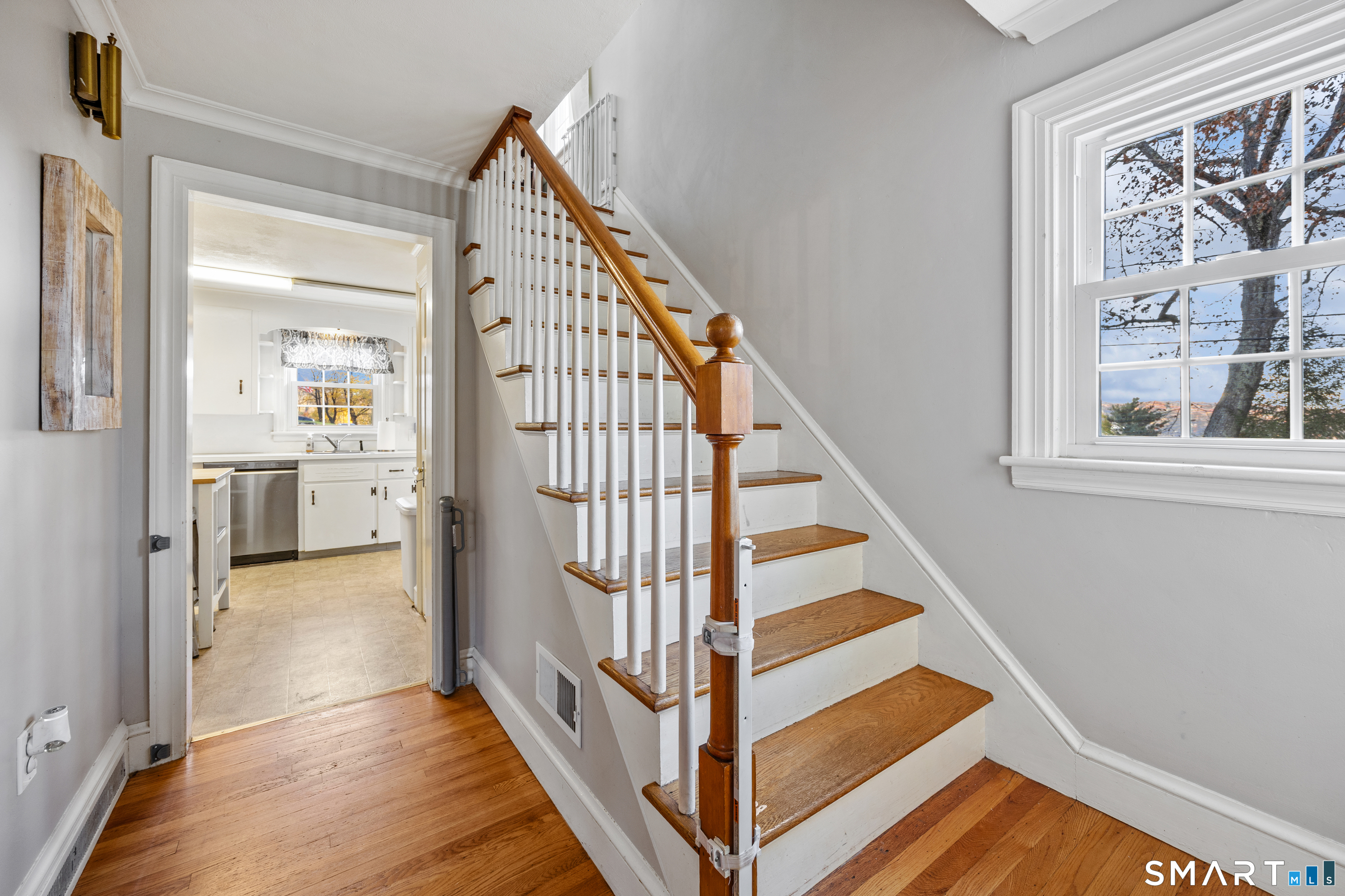 232 High Street Thomaston, CT 06787 - Photo 10 of 31 a view of a hallway with wooden floor and entryway