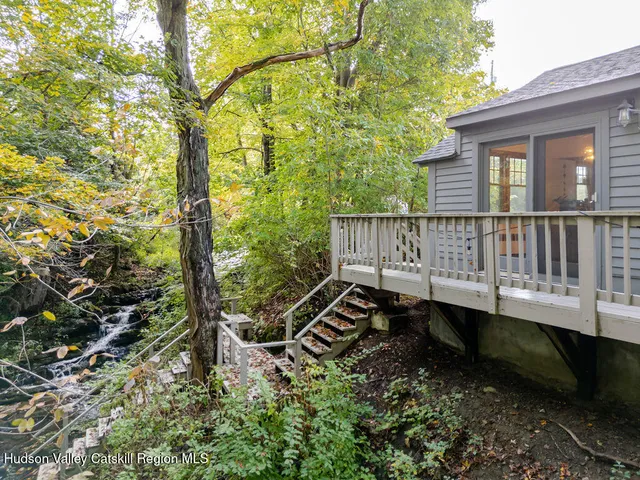 a view of a wooden deck with a bench