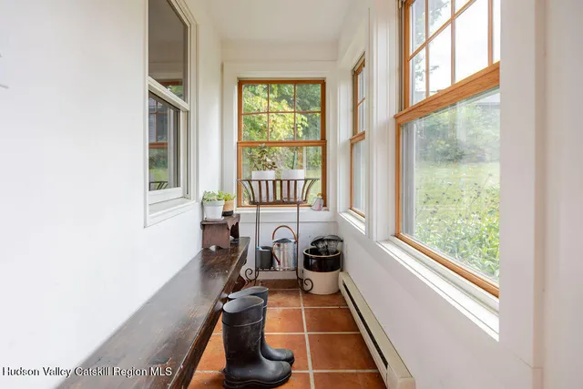 a view of a room with windows