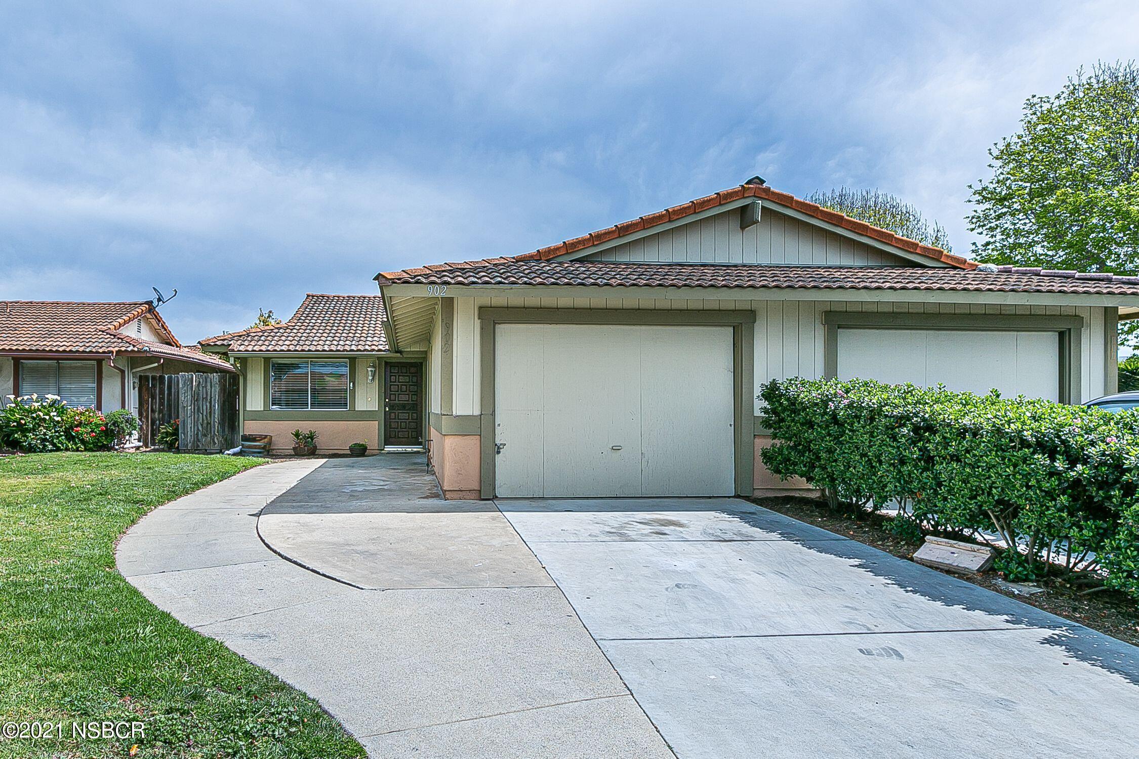 902 North O Street Lompoc, CA 93436 - Photo 2 of 25 front view of a house with a yard