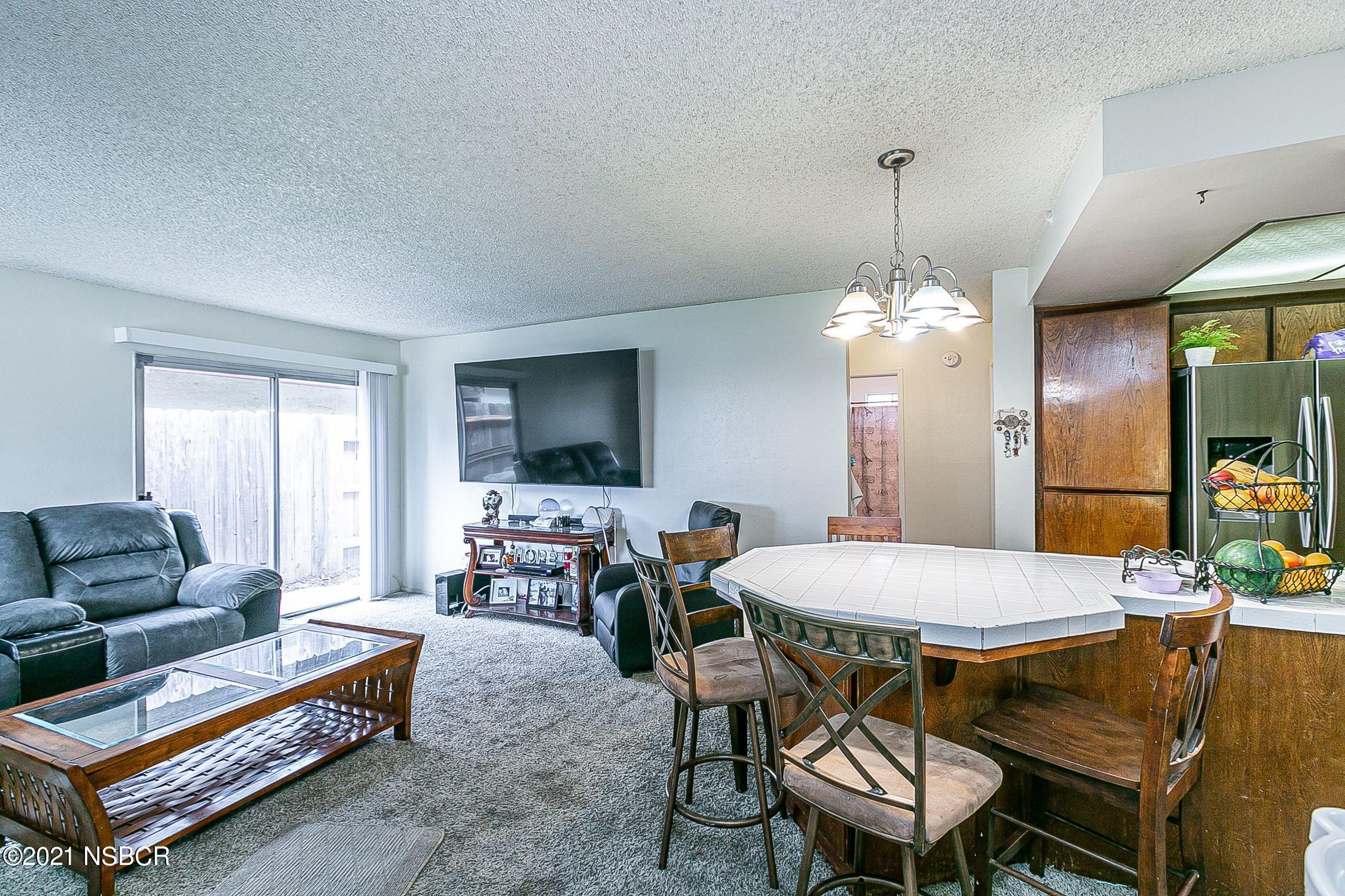 902 North O Street Lompoc, CA 93436 - Photo 8 of 25 a view of a dining room with furniture